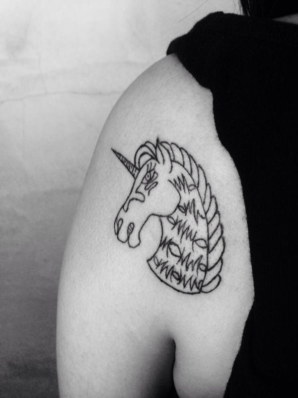 Outline Unicorn Head Tattoo On Shoulder