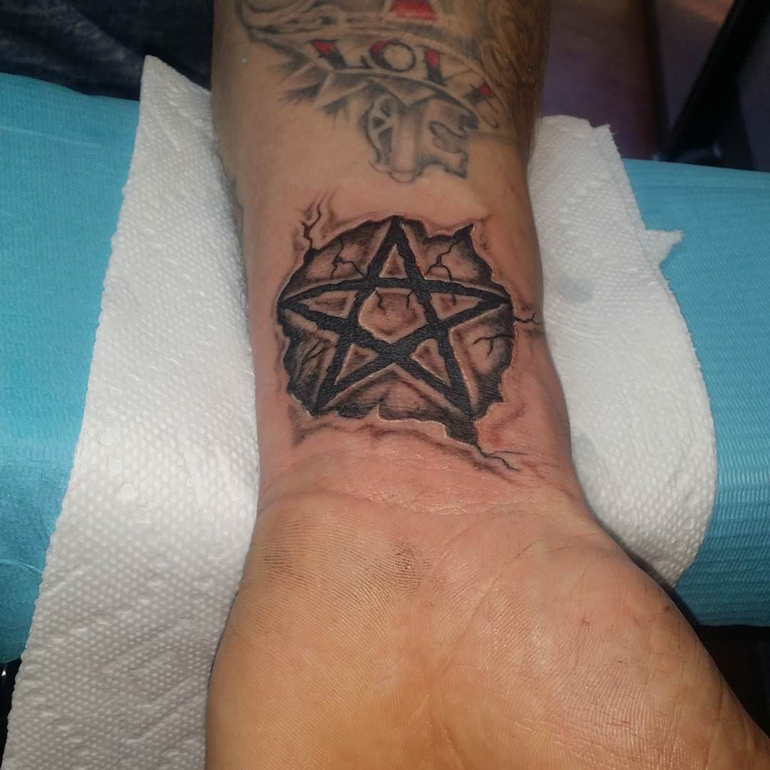 Pentagram Star Tattoo On Left Wrist