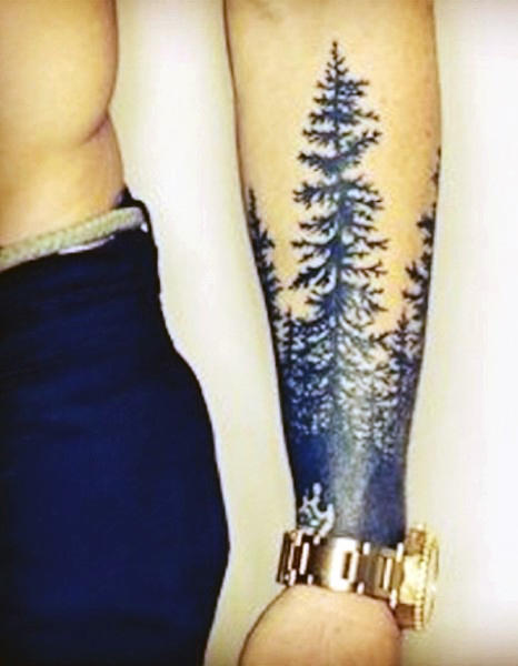 Pine Tree Tattoo On Man Left Sleeve