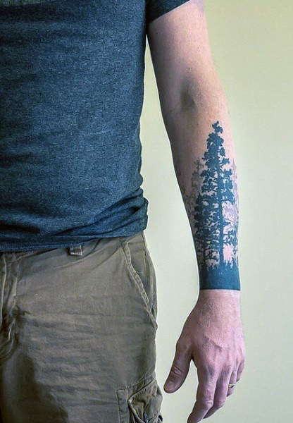 Pine Tree Tattoos On Man Left Sleeve