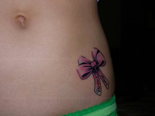 Pink Bow Tattoo On Left Hip