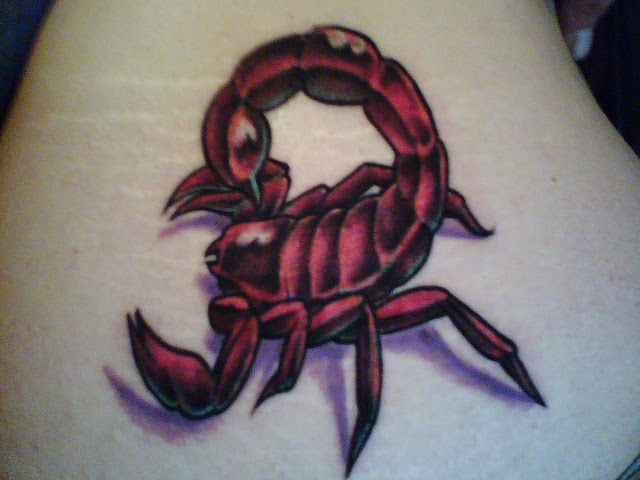 Pink Girly Scorpion Tattoo On Lower Back