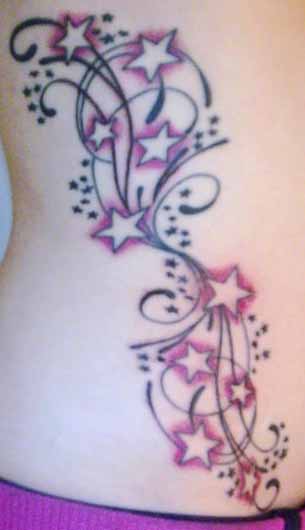 Pink Shooting Stars Tattoo On Side Rib