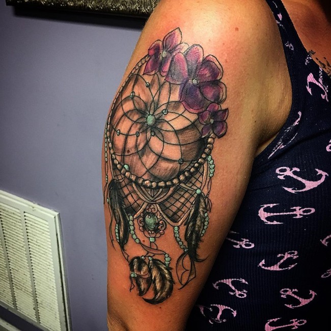 Purple Flowers And Dreamcatcher Tattoo On Girl Right Shoulder