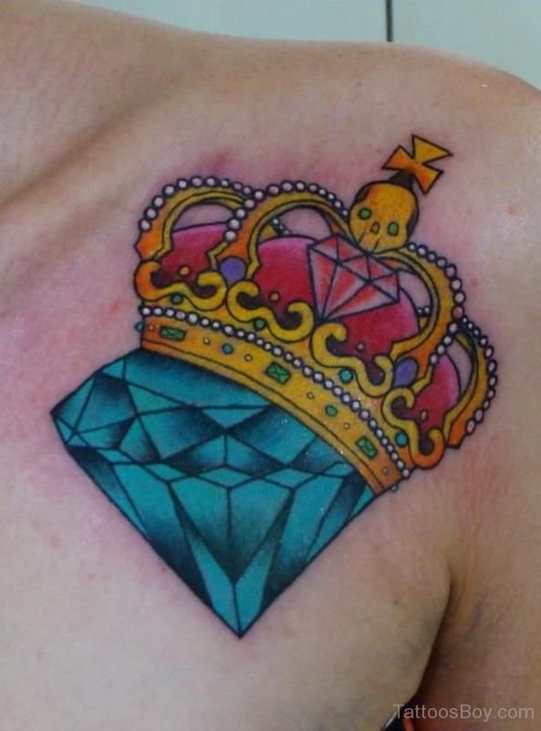 Queen Crown With Blue Diamond Tattoo On Front Shoulder