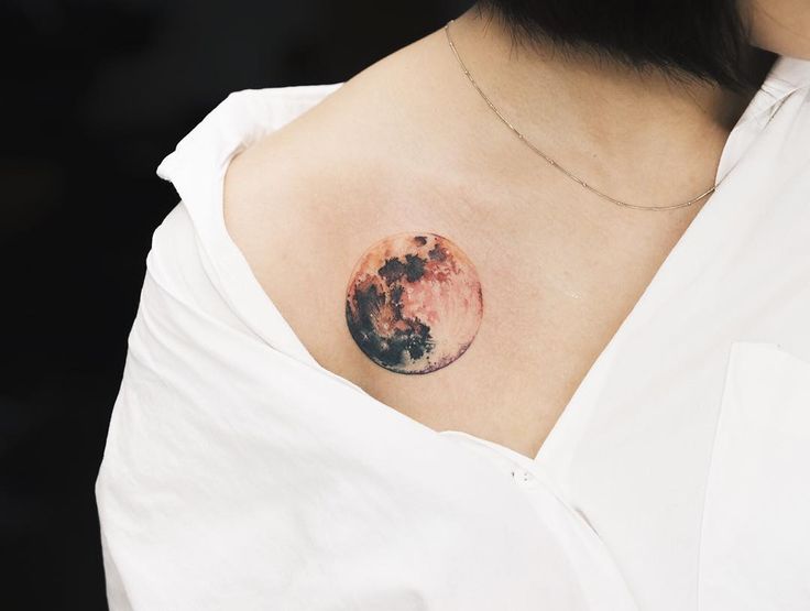 Real Moon Tattoo On Man Front Shoulder