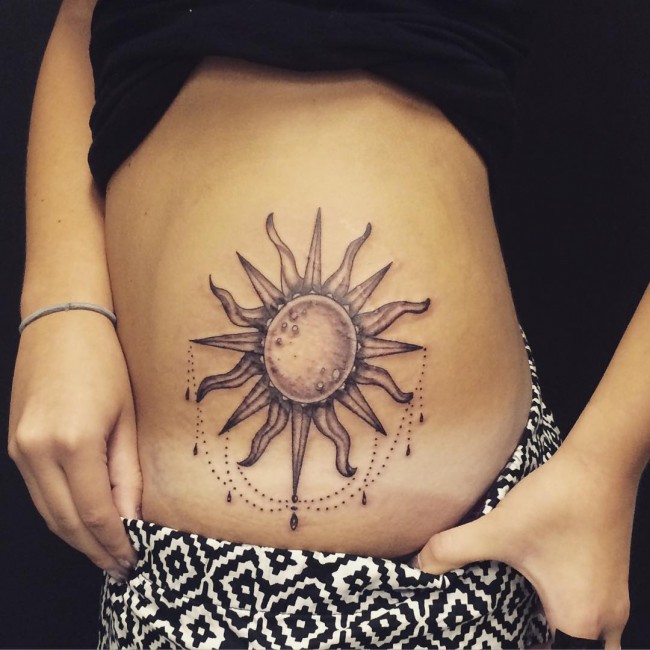Realistic Grey Ink Sun Tattoo On Side Rib