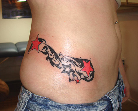 Red And Black Tribal Star Tattoos On Side Rib