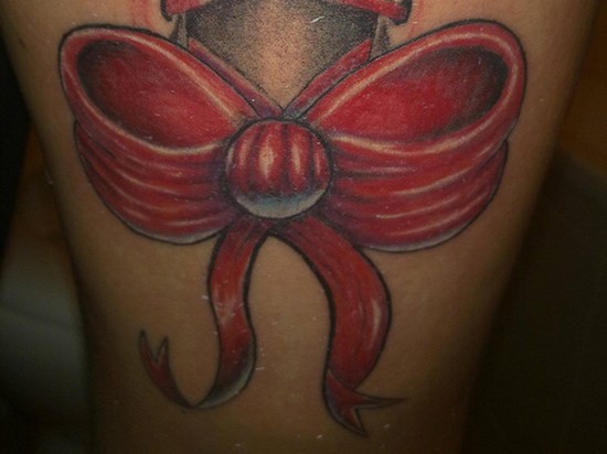 Red Bow Tattoo On Side Leg