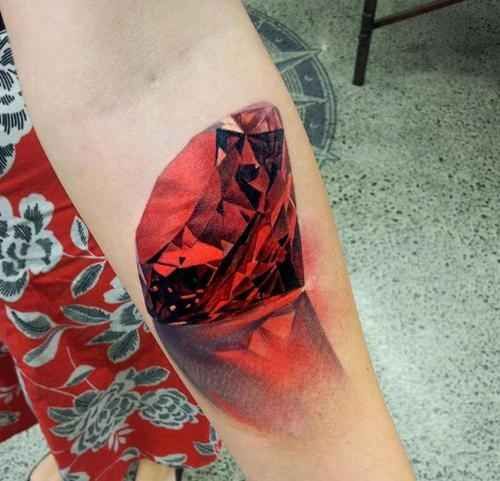 Red Realistic Diamond Tattoo On Left Forearm