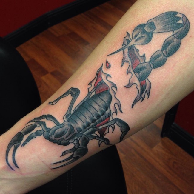 Ripped Skin Scorpion Tattoo On Forearm