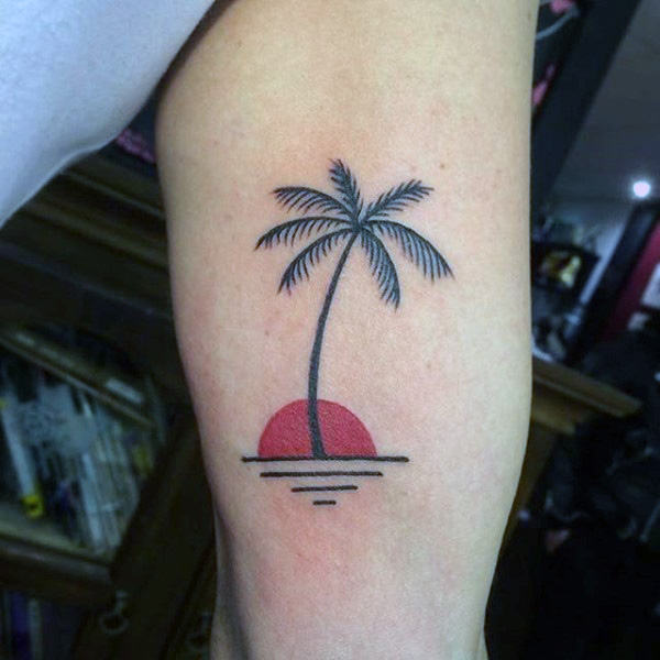 Rising Sun With Palm Tree Tattoo On Inner Bicep
