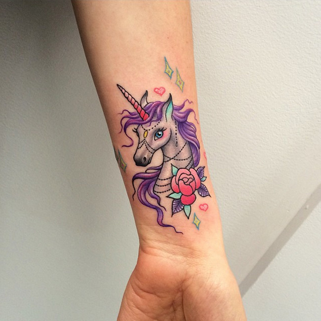Rose Flower And Gothic Unicorn Tattoo On Left Wrist