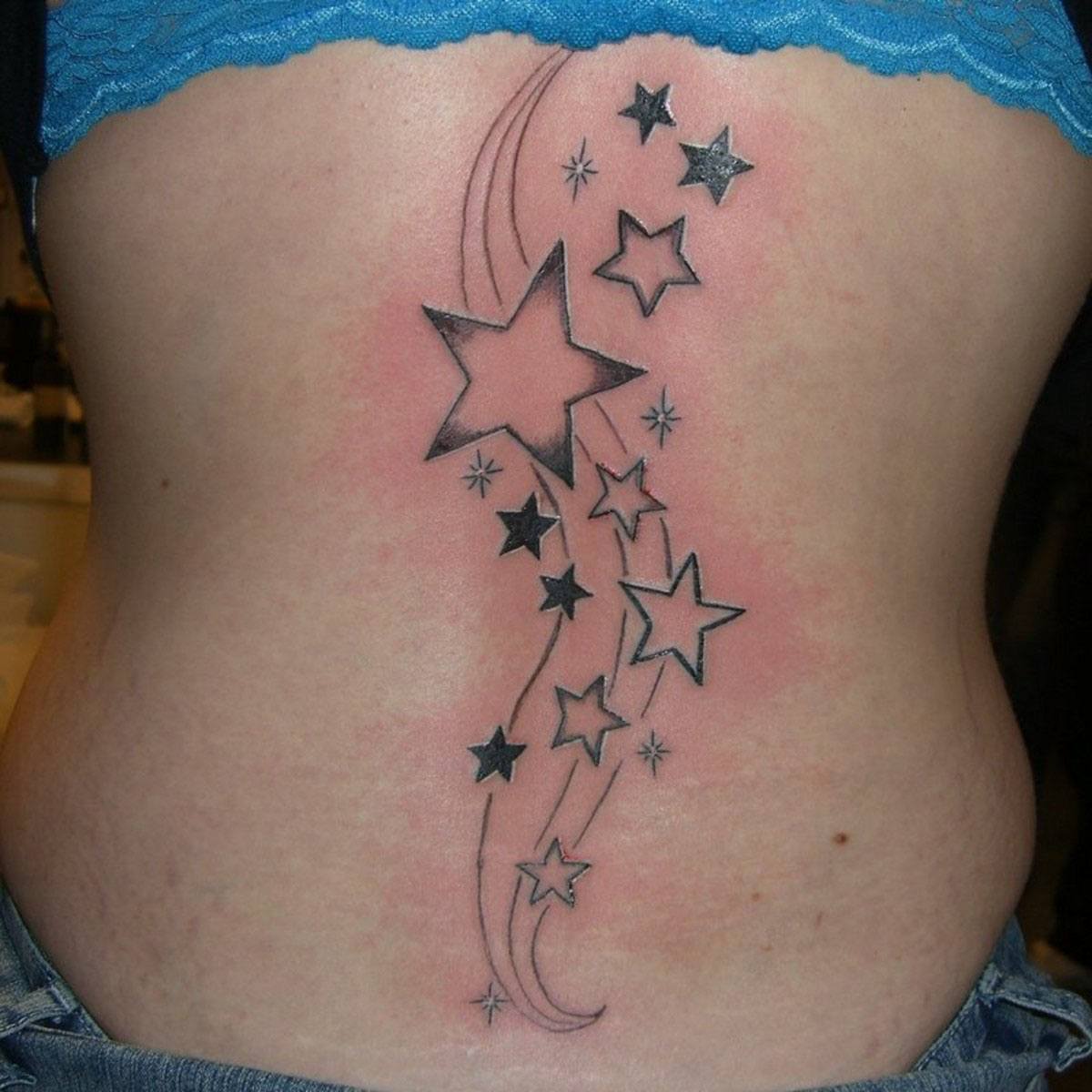 Shooting Stars Tattoos On Girl Back Body