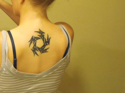 Simple Black Sun Tattoo On Upper Back