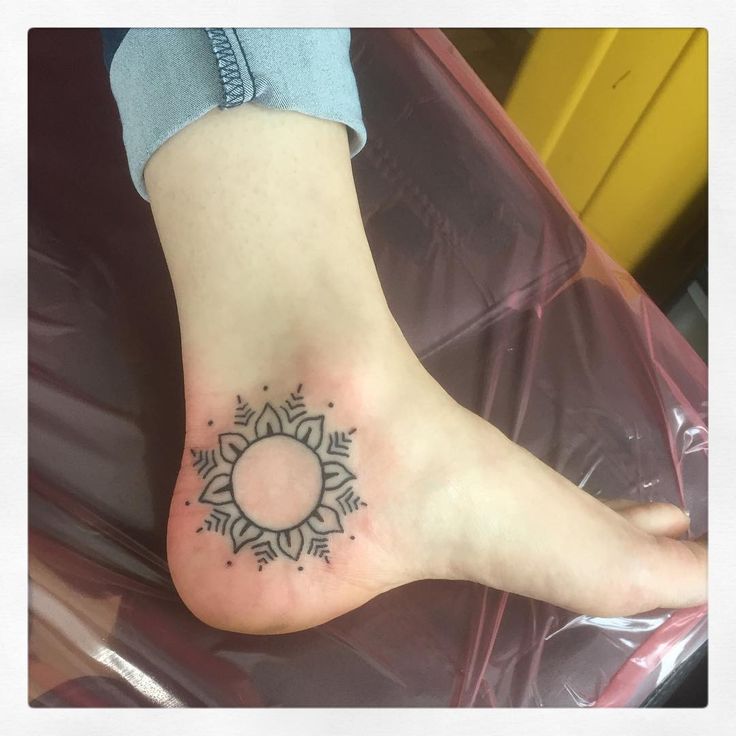Simple Outline Sun Tattoo On Girl Ankle