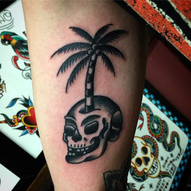 Skull And Palm Tree Tattoo On Bicep