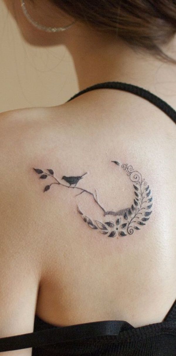 Small Black Bird Tattoo On Girl Left Back Shoulder