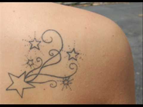 Small Outline Shooting Stars Tattoo On Back Shoulder