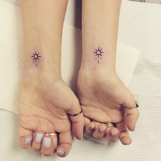 Small Sun Tattoos On Wrists