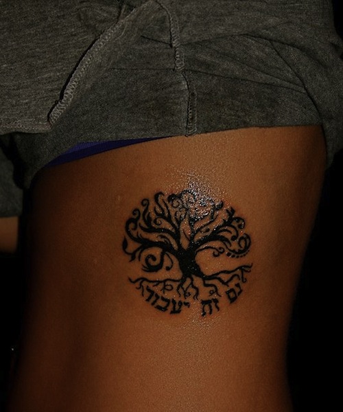 Small Tree Of Life Tattoo On Girl Side Rib