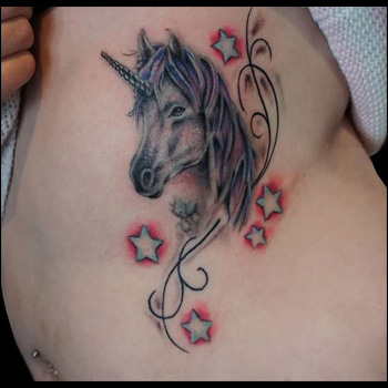 Stars And Unicorn Head Tattoo On Side Rib