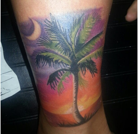 Sun Set View And Palm Tree Tattoo On Leg