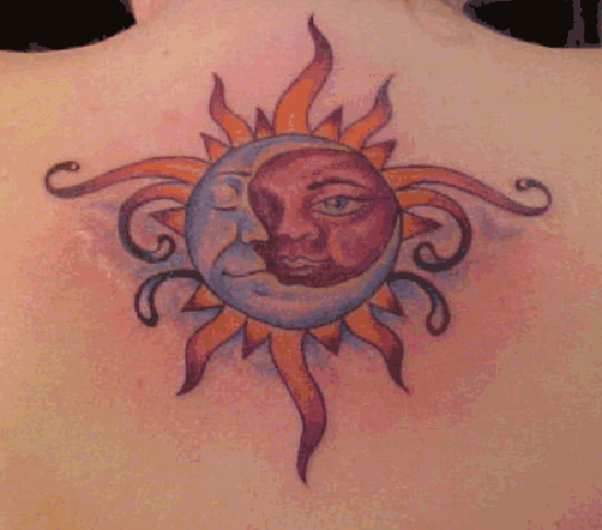 Tribal Sun And Moon Tattoo On Upper Back
