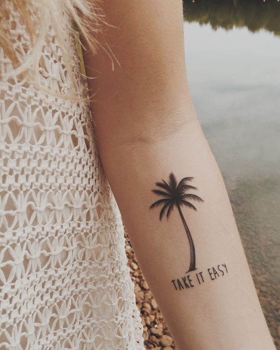 Take It Easy Palm Tree Tattoo On Girl Left Forearm