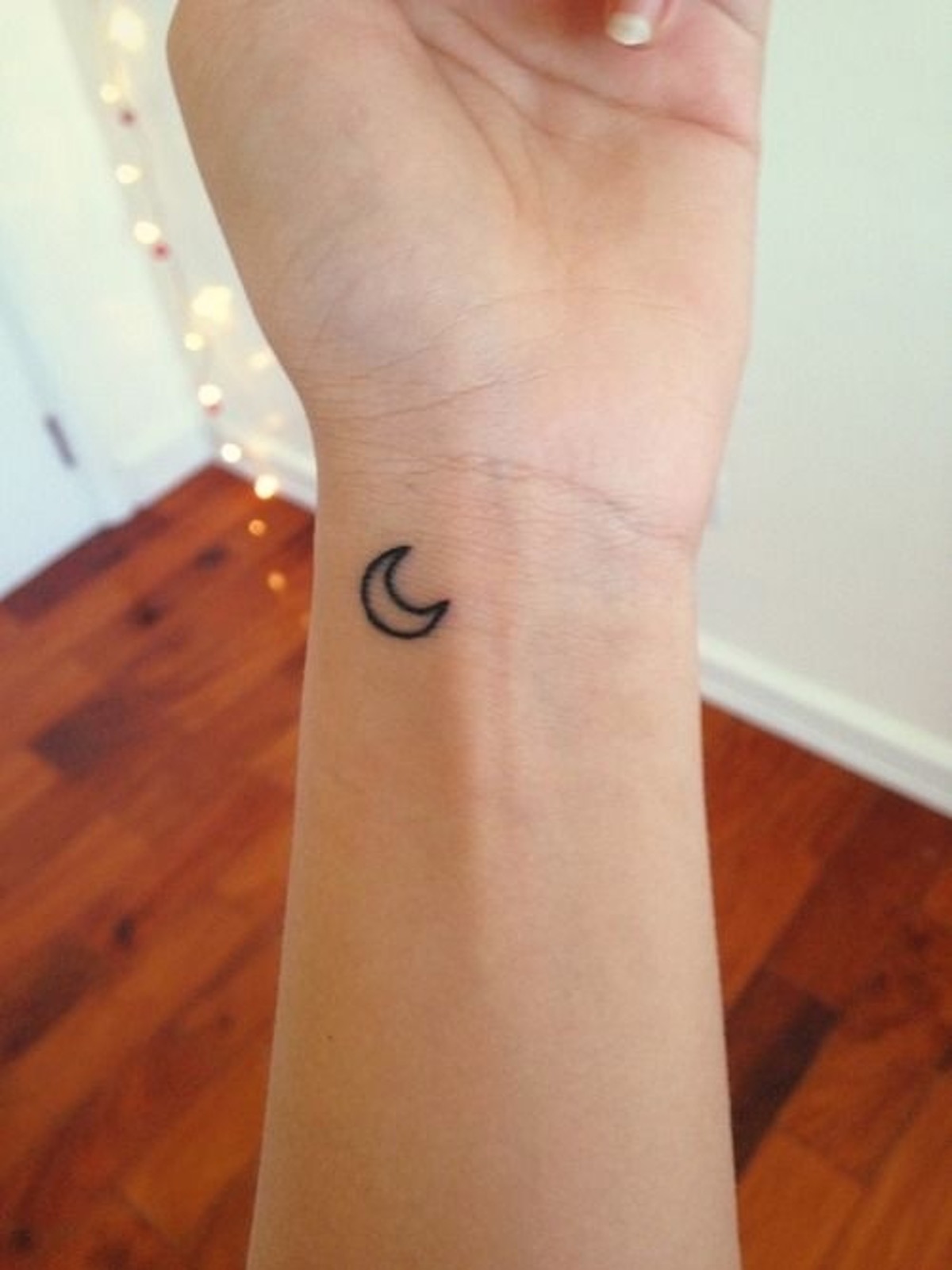 Tiny Moon Tattoo On Left Wrist