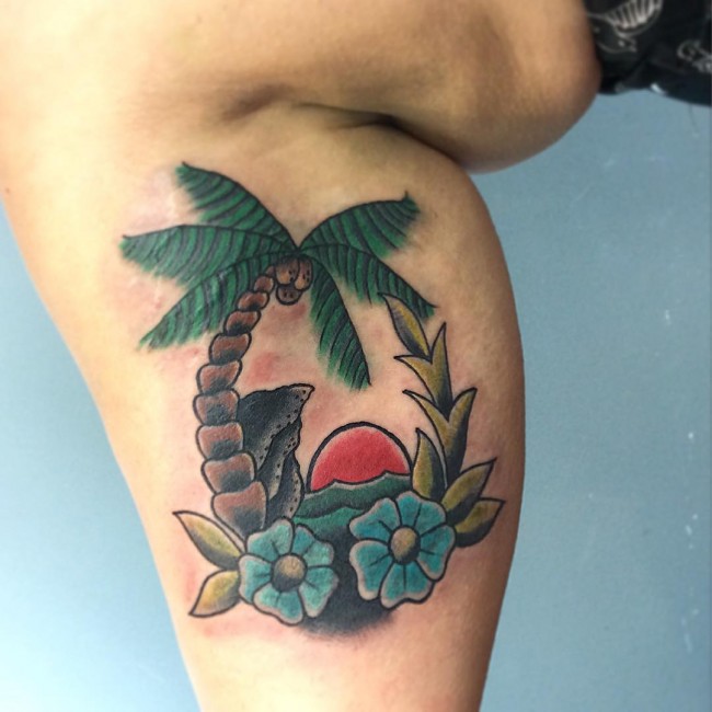 Traditional Flowers And Palm Tree Tattoo