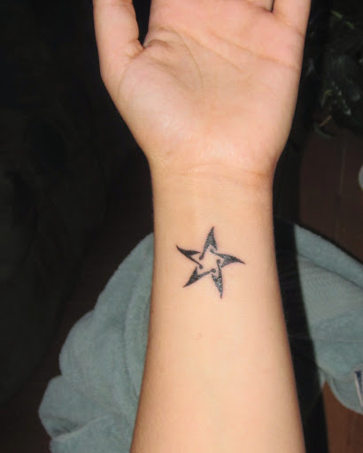 Tribal Pentagram Star Tattoo On Left Wrist