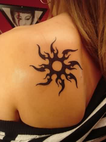 Tribal Sun Tattoo On Girl Left Back Shoulder