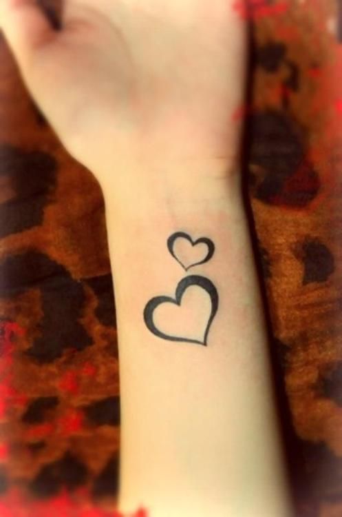 Two Black Outline Heart Tattoos On Wrist