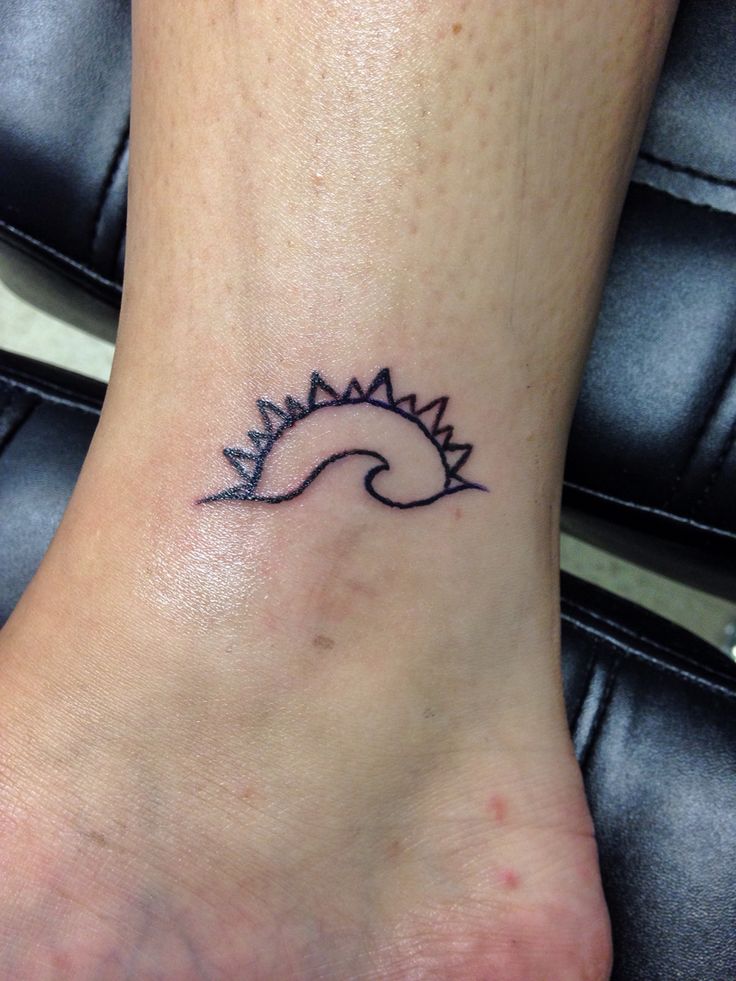 Water Wave And Simple Sun Tattoo On Ankle