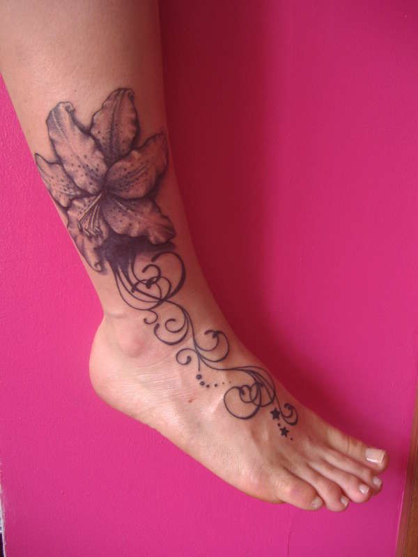 Amazing Lily Tattoo On Leg And Foot
