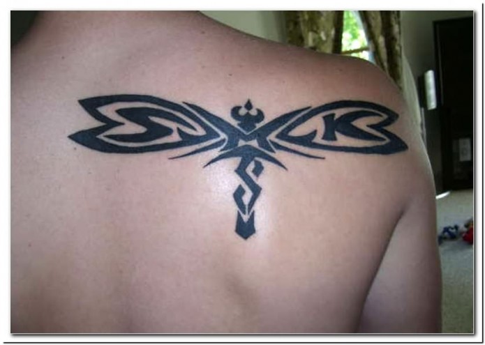 Awesome Black Tribal Dragonfly Tattoo On Right Back Shoulder