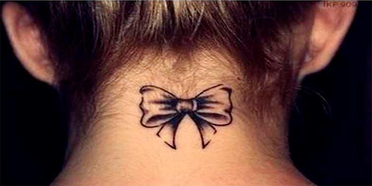 Awesome Bow Tattoo On Girl Nape