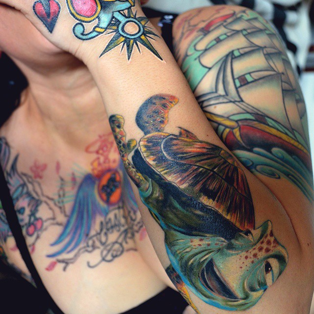 Awesome Turtle Tattoo On Girl Left Sleeve