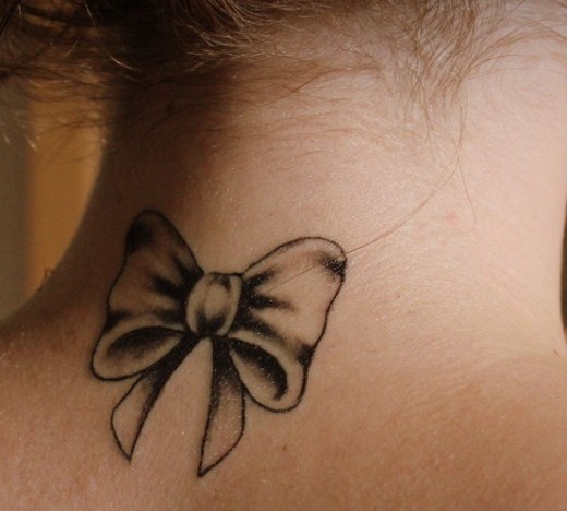 Black And Grey Bow Tattoo On Nape