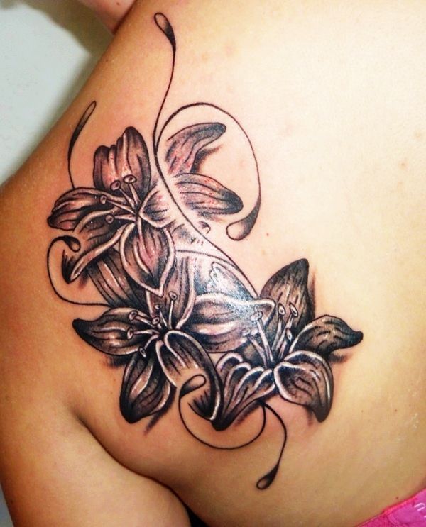 Black And Grey Lily Flower Tattoo On Back Shoulder