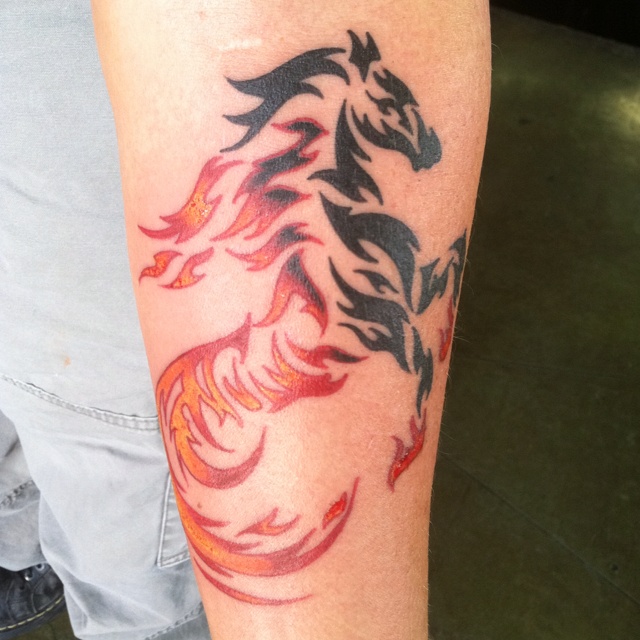 Black And Red Tribal Horse Tattoo On Arm Sleeve