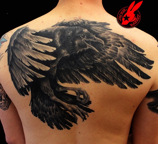 Black Flying Raven Tattoo On Man Left Back Shoulder