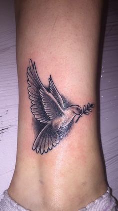 Black Ink Dove Tattoo On Leg
