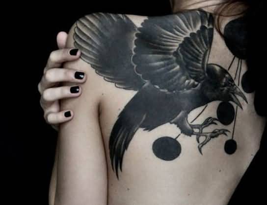 Black Ink Raven Tattoo On Girl Left Back Shoulder