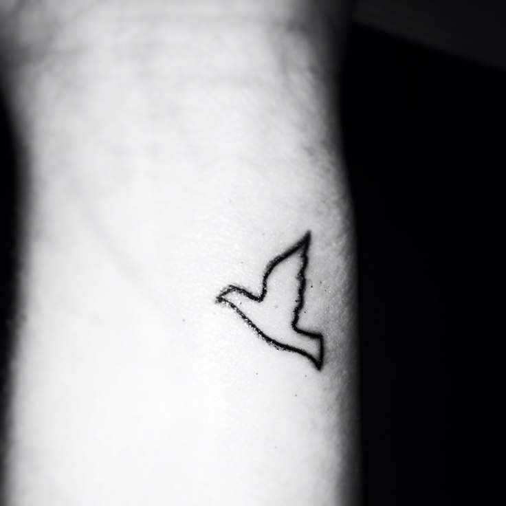 Black Outline Small Dove Tattoo On Left Wrist