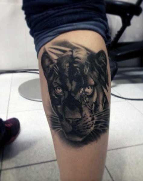 Black Panther Head Tattoo On Back Leg