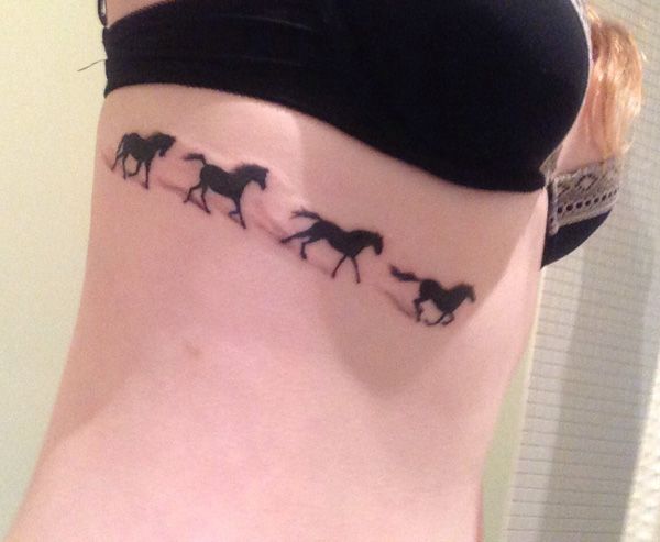 Black Silhouette Horse Tattoos On Side Rib