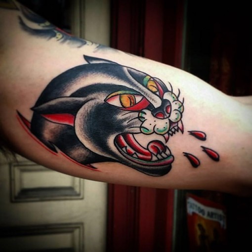 Black Traditional Panther Tattoo On Bicep