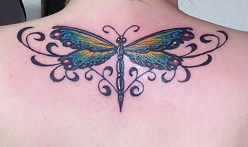 Black Tribal And Color Dragonfly Tattoo On Upper Back